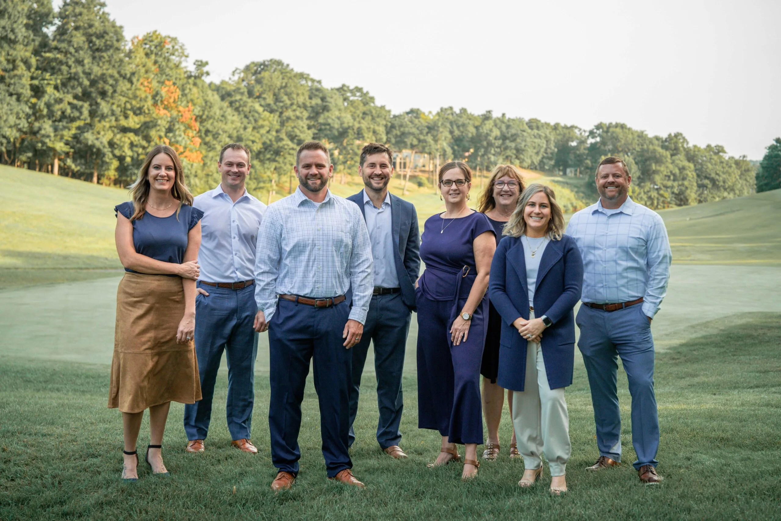 The eight members of the Rowland Sullivan team